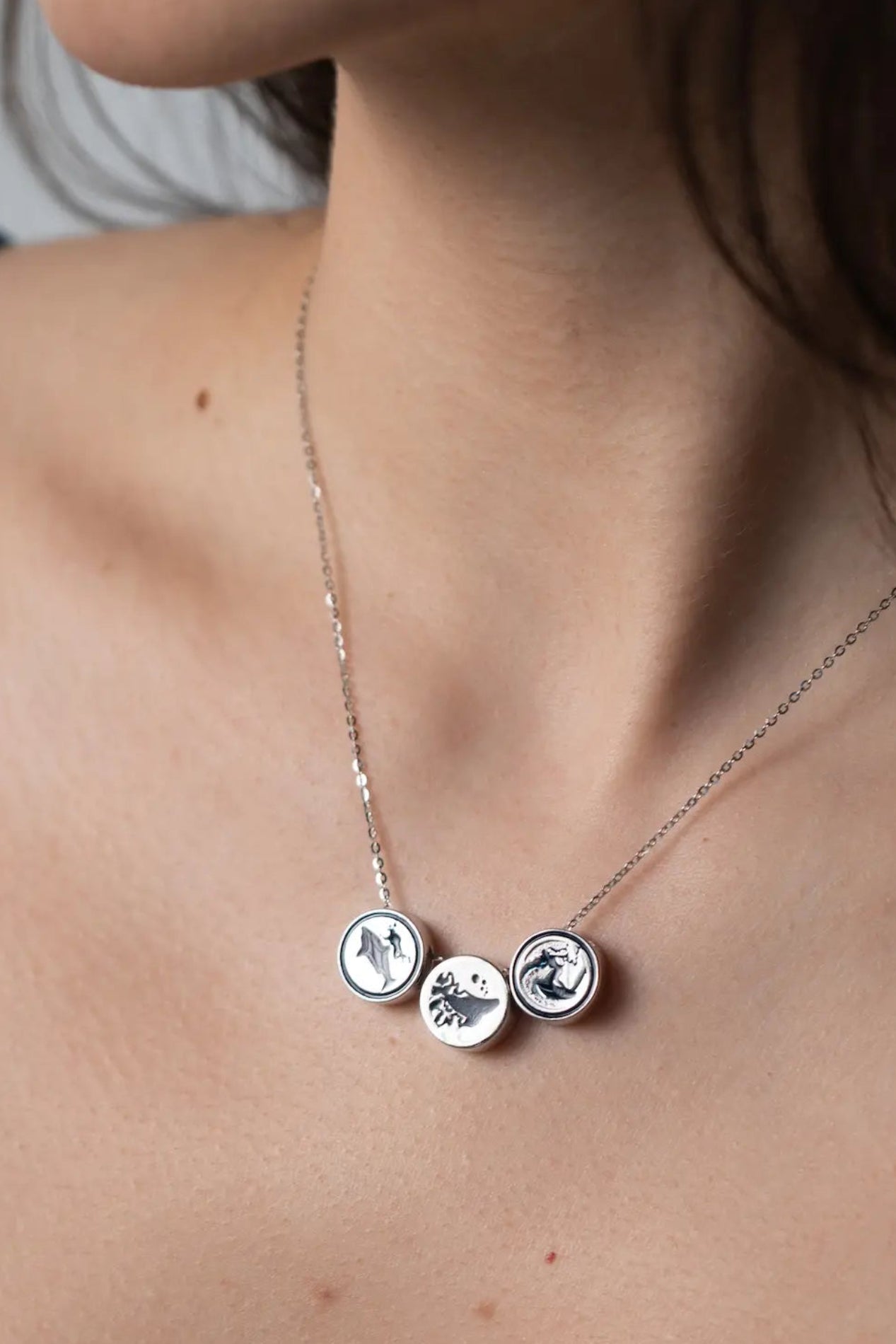 Story Stroke bucket list pendants - diving with sharks, whales, surfing on a necklace